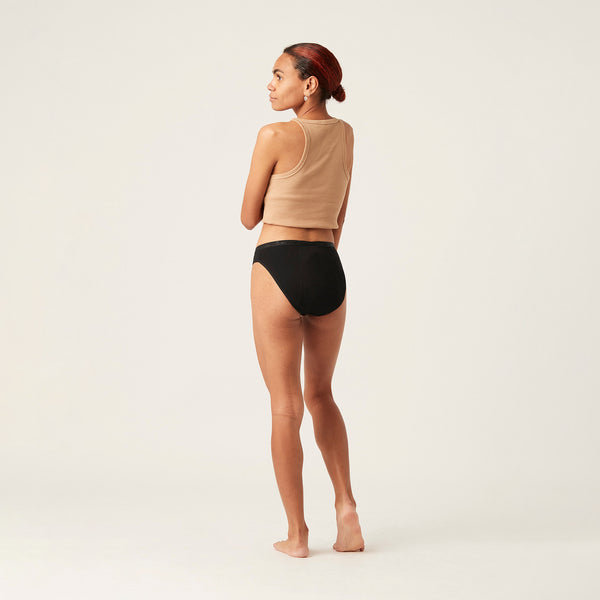 Modibodi Classic Bikini period underwear in Maxi absorbency, Black. The Classic Bikini combines everyday comfort with our ultimate Maxi protection for those with very heavy periods or frequent bladder leaks. Back View. Size 8.