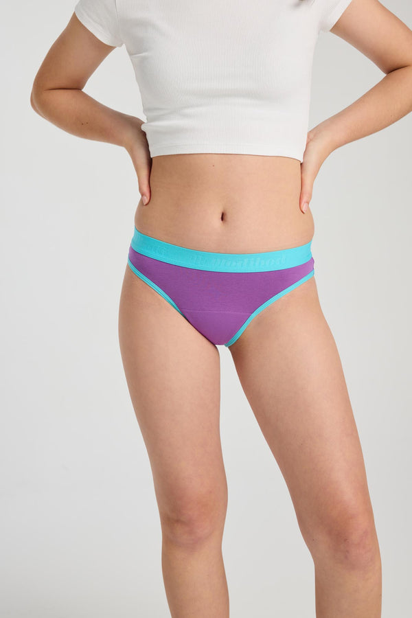 Front view Modibodi teen hipster bikini, MH absorbency period underwear, colour Power Purple. Perfect for everyday use so you can ditch disposable pads and tampons and get on with school, sport, sleepovers and more feeling comfy, confident and protected.