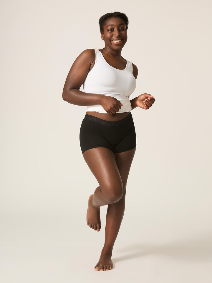 Front view Modibodi teen hipster boyshort, Super absorbency period underwear black. Super absorbency for heavy periods to overnight wear.